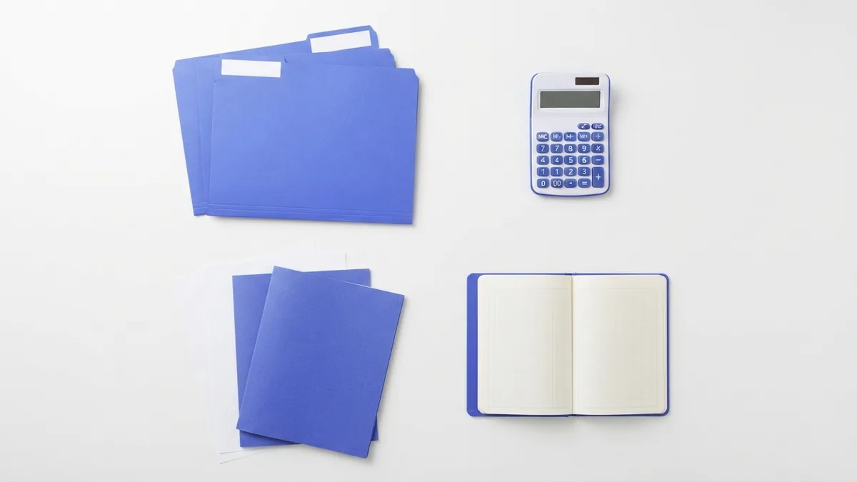 Business credit report sections shown as organized paper folders