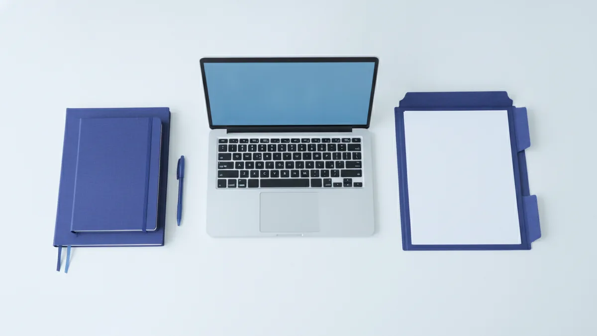 Organized study desk showing business major planning