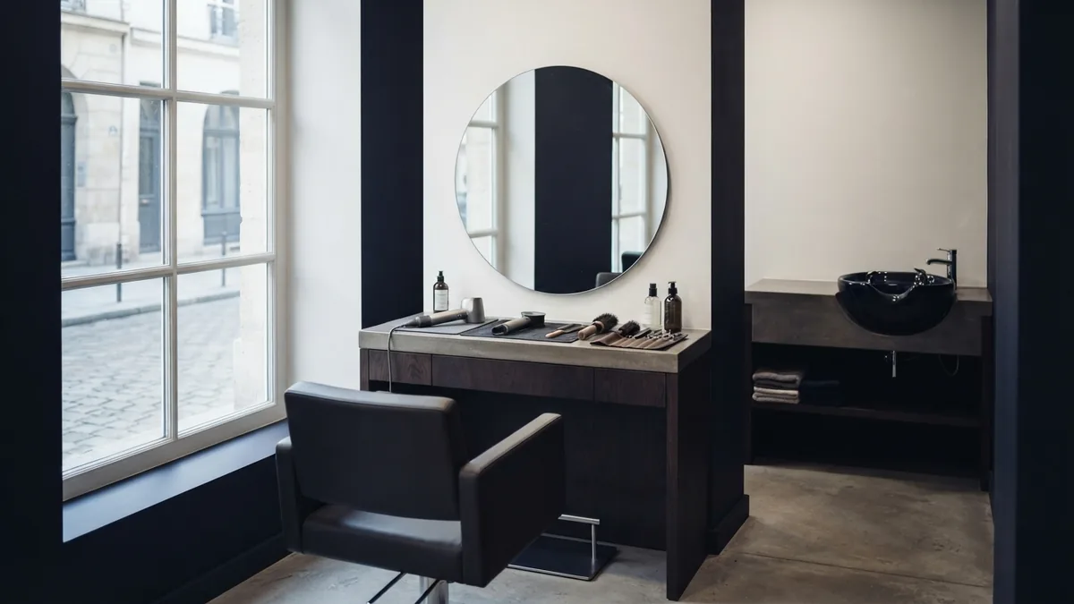 Salon equipment and location planning New salon space with a styling station and wash basin before opening